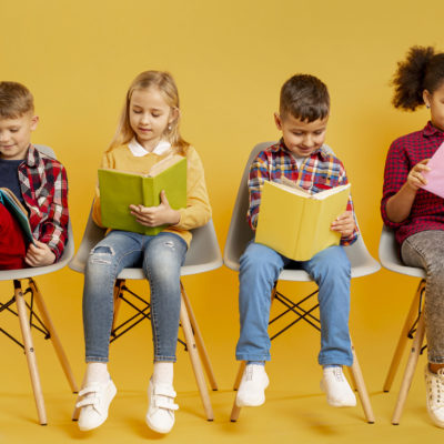 Low Angle Group Of Childrens Reading Low Angle Group Of Childrens Reading
